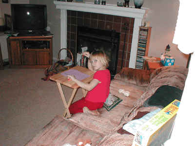 Amanda working on her homework on March 25, 2002